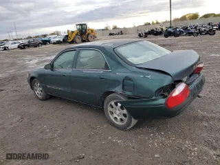2001 Mazda 626 LX with VIN 1YVGF22C215245817, listed as a Copart auction lot 80491144 with 147,603 mi miles and Salvage Title. Bid and sale history available at carsss.com. Image 2.