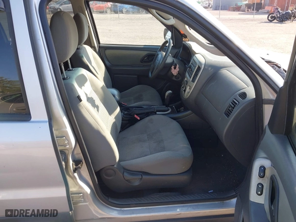 2006 Ford Escape XLT with VIN 1FMCU03166KB47650, listed as a IAAI auction lot 41529751 with 153,962 mi miles. Bid and sale history available at carsss.com. Image 5.