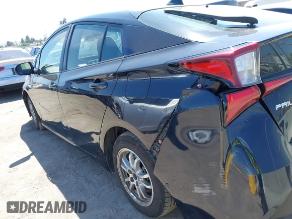 2020 Toyota Prius L Eco z VIN JTDKARFU1L3117772, wystawiony jako IAAI lot #40077005 z przebiegiem 71 892 mil mil oraz . Historia ofert i sprzedaży dostępna na DreamBid. Obrazek 18.