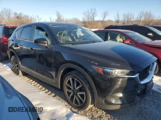 2018 Mazda CX-5 Touring z VIN JM3KFACM9J0300642, wystawiony jako Copart lot #80210854 z przebiegiem 118 309 mil mil oraz Szkoda całkowita • Salvage title. Historia ofert i sprzedaży dostępna na DreamBid. Obrazek 4.