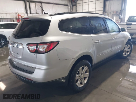 2013 Chevrolet Traverse LT with VIN 1GNKVGKDXDJ219140, listed as a IAAI auction lot 41702625 with 223,440 mi miles and . Bid and sale history available at DreamBid. Image 4.