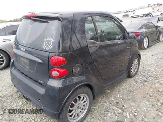 2009 Smart fortwo Pure with VIN WMEEJ31X69K244948, listed as a IAAI auction lot 41925643 with 129,877 mi miles and . Bid and sale history available at DreamBid. Image 4.