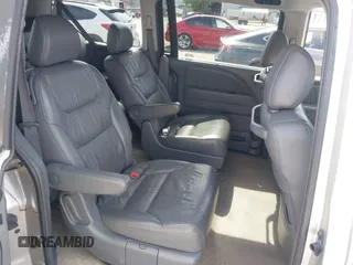 2006 Honda Odyssey EX-L z VIN 5FNRL38736B089963, wystawiony jako IAAI lot #41858061 z przebiegiem 178 845 mil mil oraz . Historia ofert i sprzedaży dostępna na DreamBid. Obrazek 8.
