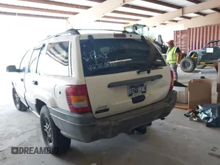 2000 Jeep Grand Cherokee Laredo with VIN 1J4G248S7YC363891, listed as a IAAI auction lot 42715393 with 238,686 mi miles and . Bid and sale history available at DreamBid. Image 3.