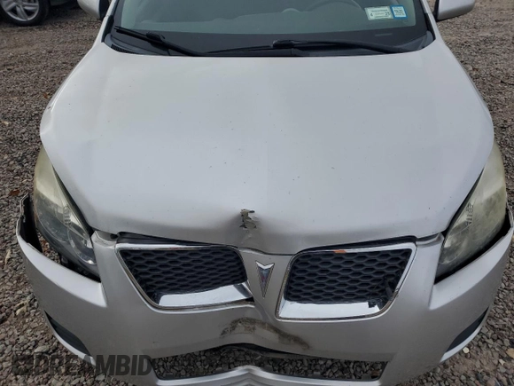 2009 Pontiac Vibe w/1SA with VIN 5Y2SP67859Z463621, listed as a Copart auction lot 77535724 with 61,888 mi miles and Salvage Title. Bid and sale history available at carsss.com. Image 12.