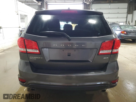 2017 Dodge Journey SXT z VIN 3C4PDDBGXHT592459, wystawiony jako Copart lot #62333025 z przebiegiem 134 778 mil mil oraz Czysty tytuł • Clean title. Historia ofert i sprzedaży dostępna na DreamBid. Obrazek 6.