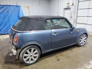 2009 MINI Convertible z VIN WMWMR335X9TJ93685, wystawiony jako Copart lot #50899755 z przebiegiem 123 609 mil mil oraz Szkoda całkowita • Salvage title. Historia ofert i sprzedaży dostępna na DreamBid. Obrazek 3.