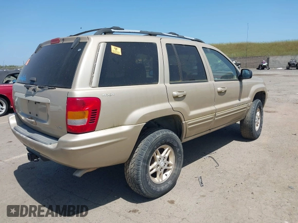 1999 Jeep Grand Cherokee Limited with VIN 1J4GW68N2XC654713, listed as a IAAI auction lot 42115829 with 195,988 mi miles. Bid and sale history available at carsss.com. Image 4.
