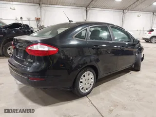 2015 Ford Fiesta S with VIN 3FADP4AJ5FM110064, listed as a IAAI auction lot 41773840 with 145,747 mi miles. Bid and sale history available at carsss.com. Image 4.