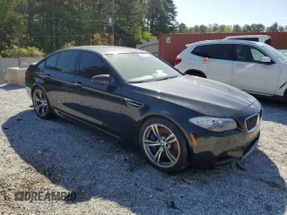 2013 BMW M5 z VIN WBSFV9C55DC772482, wystawiony jako Copart lot #52575345 z przebiegiem 173 513 mil mil oraz Czysty tytuł • Clean title. Historia ofert i sprzedaży dostępna na DreamBid. Obrazek 4.