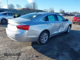 2018 Chevrolet Impala LT with VIN 2G1105SA8J9157511, listed as a IAAI auction lot 41825641 with 140,316 mi miles and . Bid and sale history available at DreamBid. Image 4.