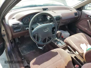 1992 Honda Accord z VIN 1HGCB7277NA019206, wystawiony jako Copart lot #54077035 z przebiegiem 227 766 mil mil oraz Szkoda całkowita • Salvage title. Historia ofert i sprzedaży dostępna na DreamBid. Obrazek 8.