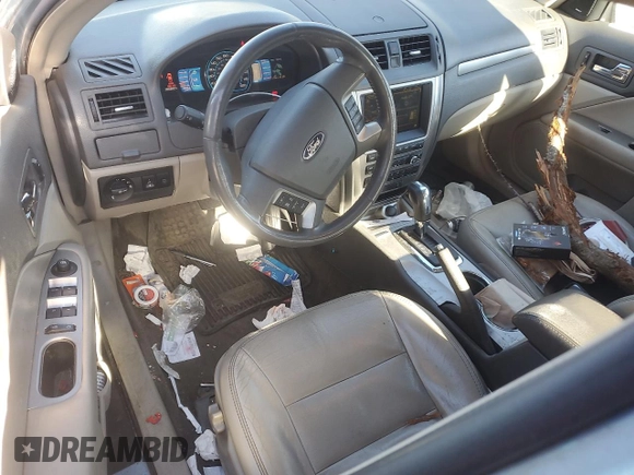 2010 Ford Fusion Hybrid with VIN 3FADP0L36AR288813, listed as a Copart auction lot 52039765 with 184,238 mi miles and Salvage title. Bid and sale history available at DreamBid. Image 8.