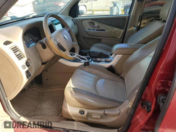 2005 Mercury Mariner Luxury z VIN 4M2YU56175DJ33563, wystawiony jako Copart lot #73497134 z przebiegiem 152 513 mil mil oraz Szkody całkowita. Historia ofert i sprzedaży dostępna na DreamBid. Obrazek 7.