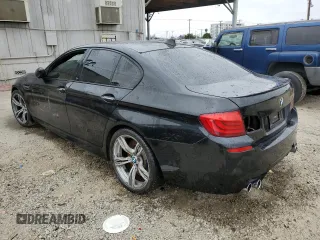 2013 BMW M5 z VIN WBSFV9C56DD096294, wystawiony jako Copart lot #57855005 z przebiegiem Nie podano mil oraz Tytuł czysty. Historia ofert i sprzedaży dostępna na DreamBid. Obrazek 2.