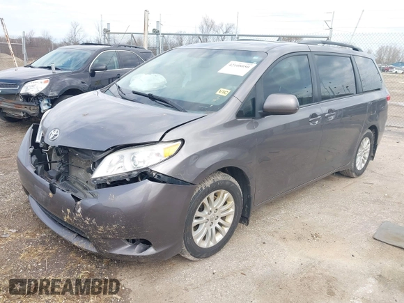 2014 Toyota Sienna XLE with VIN 5TDYK3DC4ES463315, listed as a IAAI auction lot 42108050 with 197,140 mi miles. Bid and sale history available at carsss.com. Image 17.