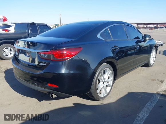 2017 Mazda Mazda6 Touring with VIN JM1GL1V55H1155696, listed as a IAAI auction lot 42003172 with 95,300 mi miles. Bid and sale history available at carsss.com. Image 4.