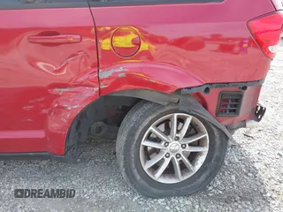 2015 Dodge Journey SXT with VIN 3C4PDCBG8FT604938, listed as a IAAI auction lot 41454168 with 146,767 mi miles. Bid and sale history available at carsss.com. Image 6.