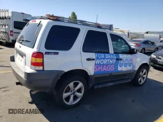 2004 Ford Escape XLS with VIN 1FMYU02184DA20455, listed as a Copart auction lot 73806544 with 322,565 mi miles and Clean Title. Bid and sale history available at DreamBid. Image 3.