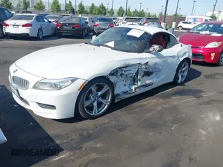 2015 BMW Z4 sDrive35i with VIN WBALM7C56FJ799025, listed as a IAAI auction lot 42707903 with 139,767 mi miles and . Bid and sale history available at DreamBid. Image 2.