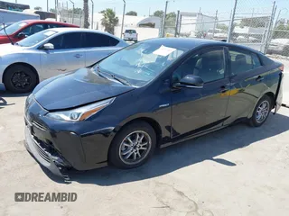 2020 Toyota Prius L Eco z VIN JTDKARFU1L3117772, wystawiony jako IAAI lot #40077005 z przebiegiem 71 892 mil mil oraz . Historia ofert i sprzedaży dostępna na DreamBid. Obrazek 19.
