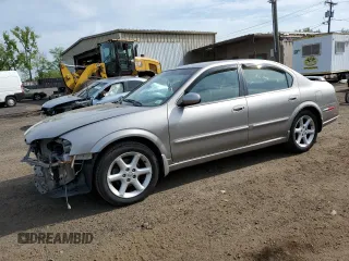 2003 Nissan Maxima SE z VIN JN1DA31D43T510617, wystawiony jako Copart lot #56357185 z przebiegiem Nie podano mil oraz Szkoda całkowita • Salvage title. Historia ofert i sprzedaży dostępna na DreamBid. Obrazek 1.