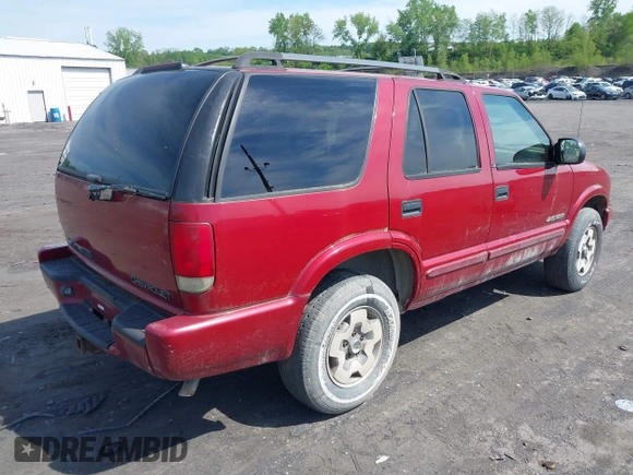 2002 Chevrolet Blazer LS z VIN 1GNDT13WX2K237284, wystawiony jako IAAI lot #42193499 z przebiegiem 137 258 mil mil oraz . Historia ofert i sprzedaży dostępna na DreamBid. Obrazek 4.