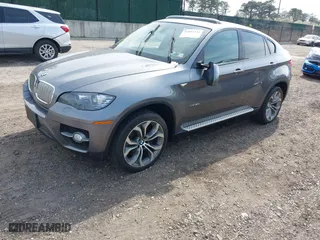2012 BMW X6 50i with VIN 5UXFG8C57CLZ97446, listed as a IAAI auction lot 42054724 with 131,079 mi miles. Bid and sale history available at carsss.com. Image 2.