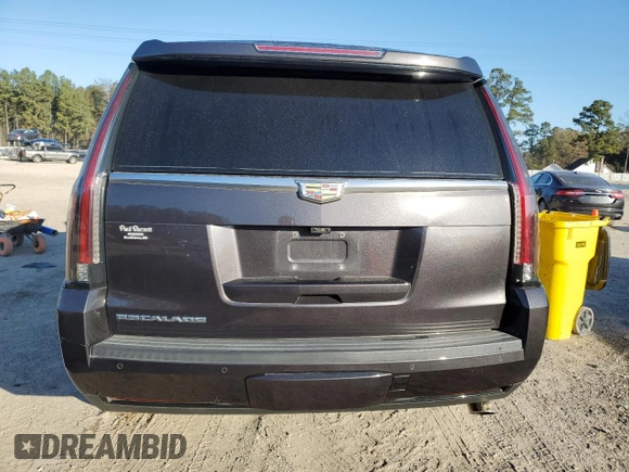 2018 Cadillac Escalade Luxury z VIN 1GYS3BKJXJR138217, wystawiony jako Copart lot #86212934 z przebiegiem Nie podano mil oraz Szkody całkowita. Historia ofert i sprzedaży dostępna na DreamBid. Obrazek 6.