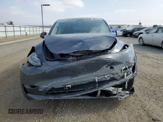 2024 Tesla Model Y z VIN 7SAYGDED4RF126610, wystawiony jako Copart lot #61455825 z przebiegiem 19 049 mil mil oraz Czysty tytuł • Clean title. Historia ofert i sprzedaży dostępna na DreamBid. Obrazek 5.