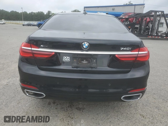 2019 BMW 7 Series 740i xDrive z VIN WBA7E4C55KGV70212, wystawiony jako Copart lot #57330965 z przebiegiem 48 408 mil mil oraz Szkoda całkowita • Salvage title. Historia ofert i sprzedaży dostępna na DreamBid. Obrazek 6.