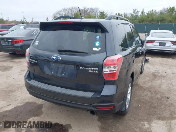 2014 Subaru Forester 2.5i Limited with VIN JF2SJAJC1EH517094, listed as a IAAI auction lot 41953103 with 145,122 mi miles. Bid and sale history available at carsss.com. Image 4.