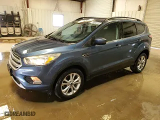 2018 Ford Escape SE with VIN 1FMCU0GD7JUC87482, listed as a Copart auction lot 52914045 with 123,898 mi miles and Clean Title. Bid and sale history available at carsss.com. Image 1.