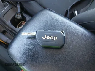 2021 Jeep Wrangler Unlimited Sport S with VIN 1C4HJXDG5MW804748, listed as a IAAI auction lot 41878895 with 35,839 mi miles and . Bid and sale history available at DreamBid. Image 11.