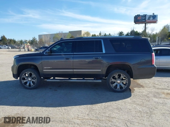 2015 GMC Yukon XL Denali with VIN 1GKS2JKJ9FR634771, listed as a IAAI auction lot 41676218 with 73,271 mi miles. Bid and sale history available at carsss.com. Image 14.