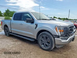 2023 Ford F-150 XL with VIN 1FTEW1C57PFC27842, listed as a Copart auction lot 59906015 with 43,495 mi miles and Salvage title. Bid and sale history available at DreamBid. Image 4.