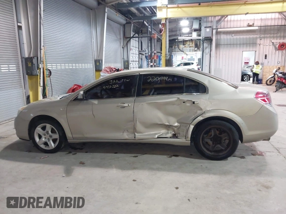 2009 Saturn Aura XE with VIN 1G8ZS57B99F156757, listed as a IAAI auction lot 41932582 with 220,444 mi miles and . Bid and sale history available at DreamBid. Image 14.
