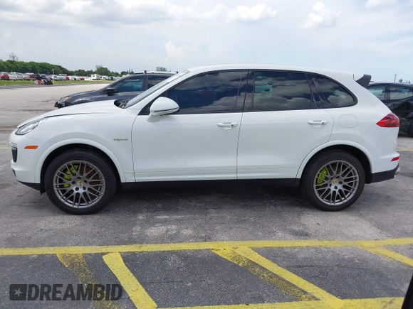 2016 Porsche Cayenne S E-Hybrid with VIN WP1AE2A25GLA63698, listed as a IAAI auction lot 42694555 with 141,957 mi miles and . Bid and sale history available at DreamBid. Image 14.
