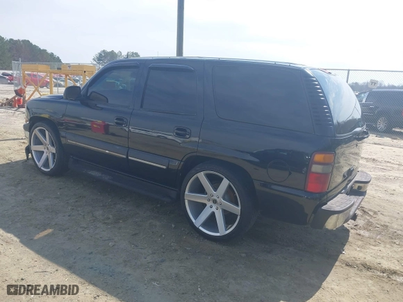 2003 Chevrolet Tahoe LT with VIN 1GNEC13Z73J322783, listed as a IAAI auction lot 41773868 with 259,710 mi miles. Bid and sale history available at carsss.com. Image 3.