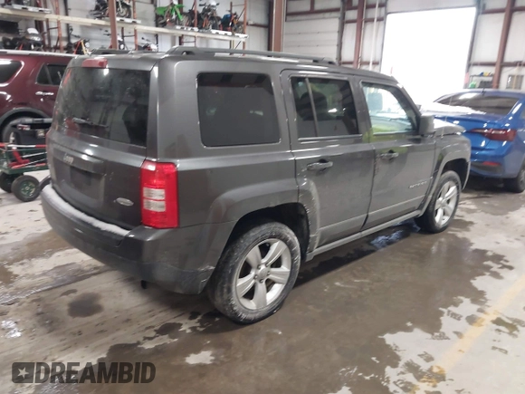 2016 Jeep Patriot High Altitude Edition with VIN 1C4NJRFB0GD632774, listed as a IAAI auction lot 41149683 with 96,495 mi miles. Bid and sale history available at carsss.com. Image 4.