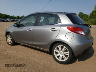 2012 Mazda 2 Sport с VIN JM1DE1KYXC0134076, выставлен на аукционе Copart как лот 59397405 с пробегом 139 931 миль миль и Чистый • Clean title. История ставок и продаж доступна на DreamBid. Изображение 2.