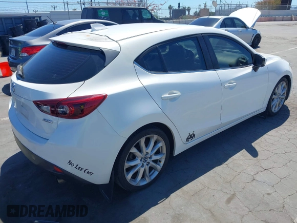 2015 Mazda 3 S Grand Touring with VIN JM1BM1M39F1233093, listed as a IAAI auction lot 42245609 with 137,487 mi miles and . Bid and sale history available at DreamBid. Image 4.