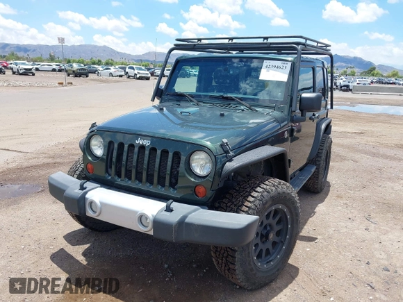 2012 Jeep Wrangler Sahara z VIN 1C4AJWBGXCL100527, wystawiony jako IAAI lot #42394623 z przebiegiem 126 097 mil mil oraz . Historia ofert i sprzedaży dostępna na DreamBid. Obrazek 6.