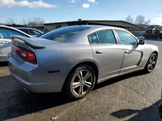 2013 Dodge Charger RT with VIN 2C3CDXDTXDH594939, listed as a Copart auction lot 85088784 with 118,035 mi miles and Clean Title. Bid and sale history available at carsss.com. Image 3.