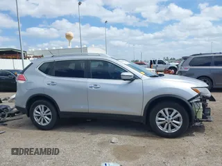 2016 Nissan Rogue S with VIN KNMAT2MT7GP595135, listed as a IAAI auction lot 41807286 with 103,576 mi miles and . Bid and sale history available at DreamBid. Image 14.