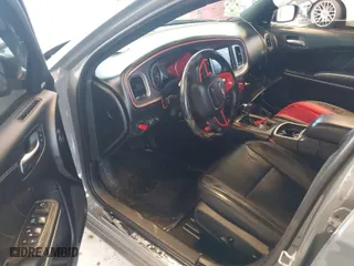 2019 Dodge Charger SXT with VIN 2C3CDXJG2KH547683, listed as a IAAI auction lot 41232974 with 75,960 mi miles. Bid and sale history available at carsss.com. Image 5.
