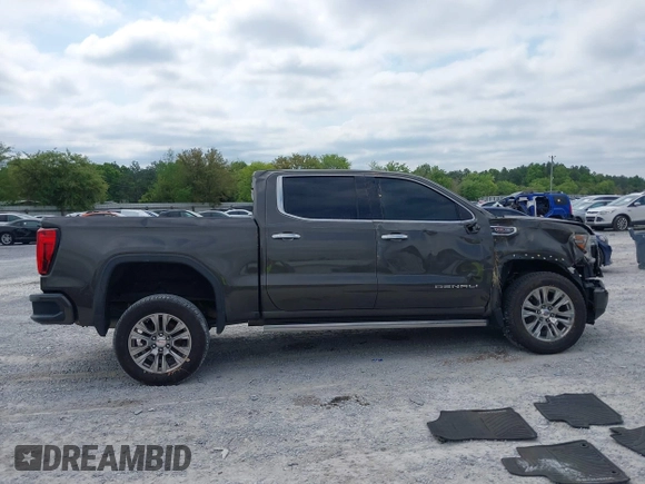 2019 GMC Sierra 1500 Denali z VIN 1GTU9FEL8KZ180128, wystawiony jako IAAI lot #42028488 z przebiegiem 78 015 mil mil oraz . Historia ofert i sprzedaży dostępna na DreamBid. Obrazek 13.