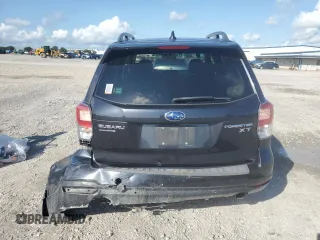 2017 Subaru Forester Touring with VIN JF2SJGWC5HH482107, listed as a Copart auction lot 60975725 with 71,889 mi miles and Salvage title. Bid and sale history available at DreamBid. Image 6.