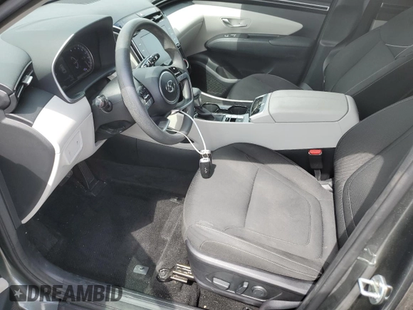 2022 Hyundai Tucson SEL z VIN 5NMJB3AE9NH057198, wystawiony jako Copart lot #60405555 z przebiegiem 51 012 mil mil oraz Nie do naprawy • Non repairable. Historia ofert i sprzedaży dostępna na DreamBid. Obrazek 7.