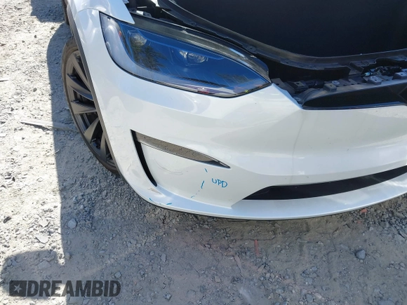 2023 Tesla Model X with VIN 7SAXCDE54PF430808, listed as a IAAI auction lot 41667924 with 21,100 mi miles and . Bid and sale history available at DreamBid. Image 6.